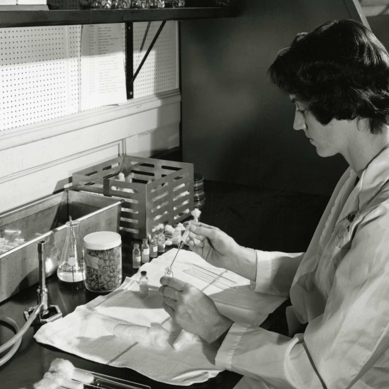 Laboratory Technician. Photograph, mid-20th century. Courtesy U.S. National Library of Medicine. 