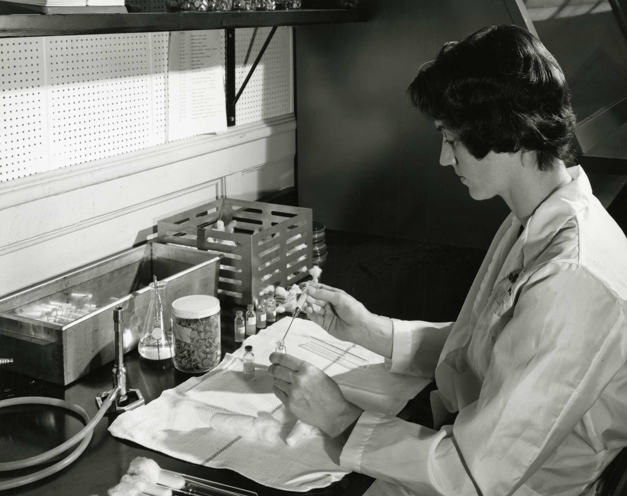 Laboratory Technician. Photograph, mid-20th century. Courtesy U.S. National Library of Medicine.