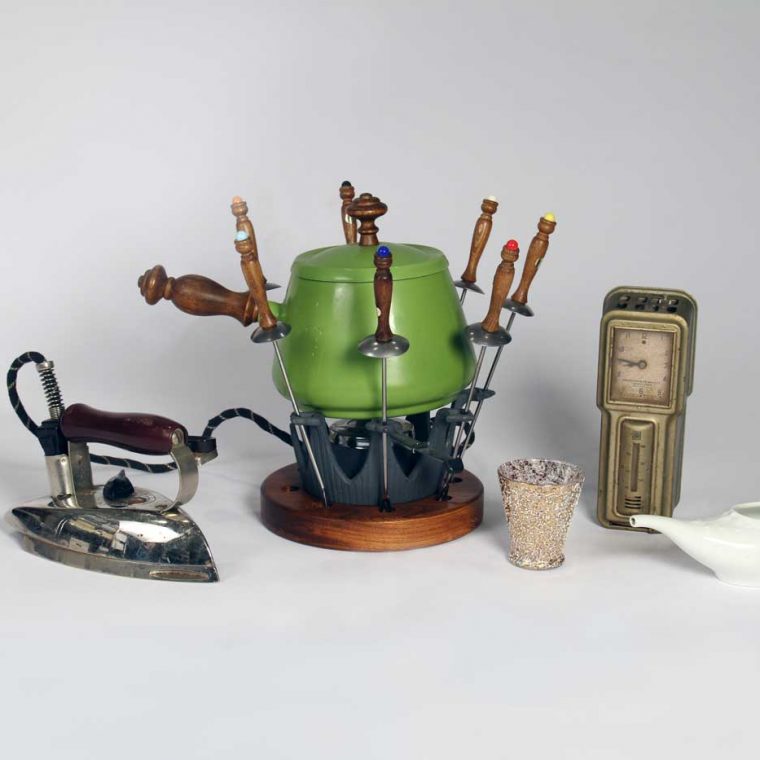 Iron, 1930s; Fondue set, 1970s; Cocktail glass, 1950s; Thermostat, 1920s; Pap feeder, 1880s. Photo by Museum staff. 