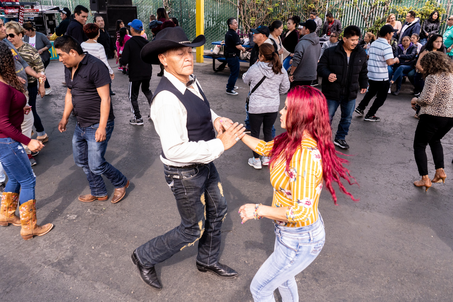 March 8, 2020: Dancing at the West Wind Coliseum Public Market, 5401 Coliseum Way, Oakland, California. © Camilo José Vergara