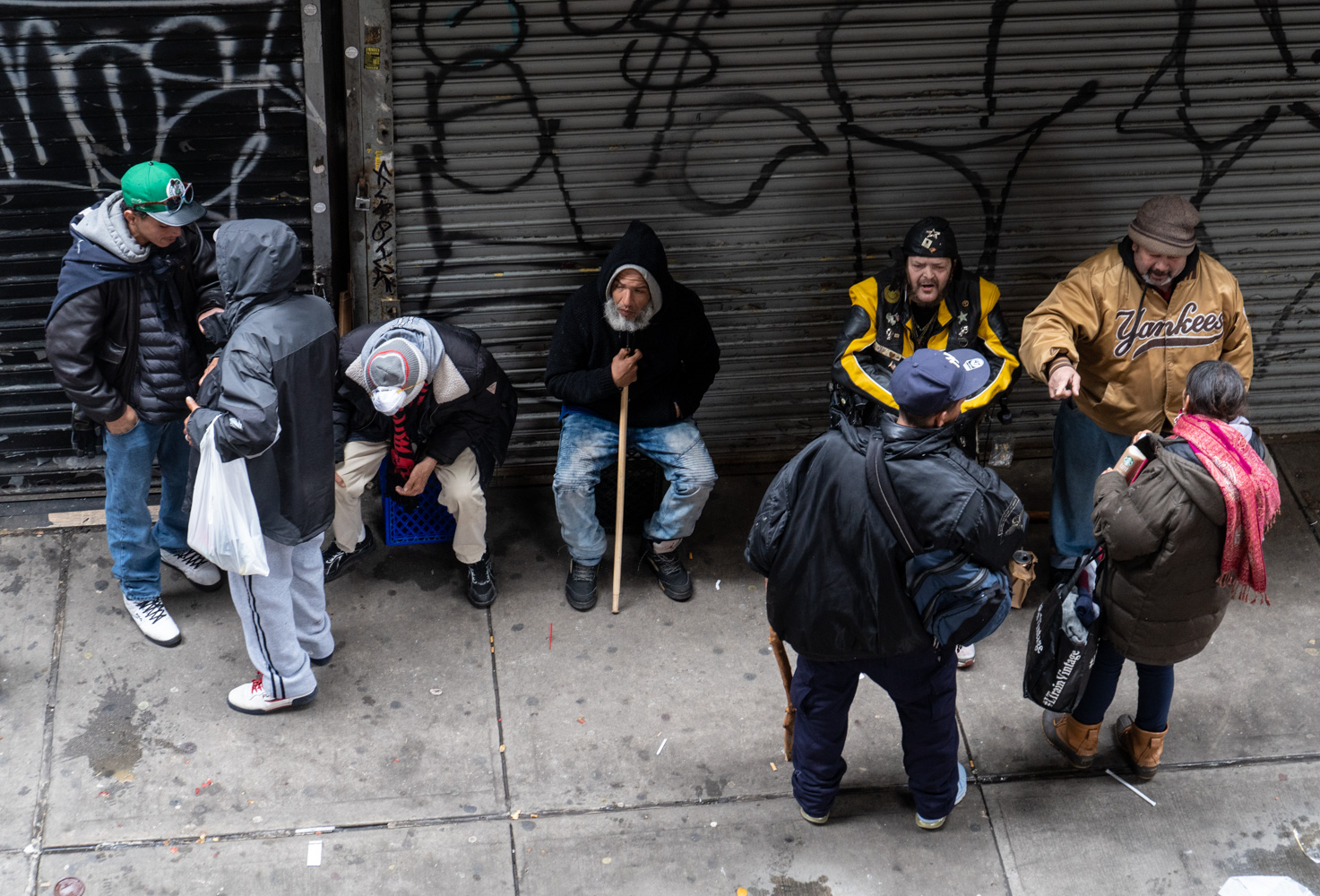 March 30, 2020: Socializing under the Myrtle Avenue Subway Station, 943 Broadway, Brooklyn, New York. © Camilo José Vergara