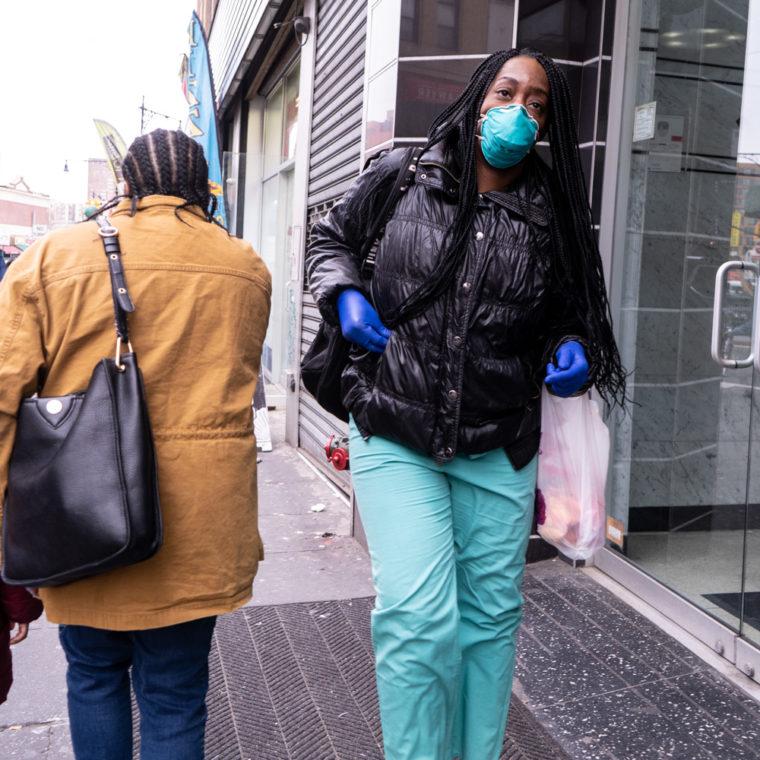 March 18, 2020: Healthcare worker on East 149th Street at Third Avenue, Bronx, New York. © Camilo José Vergara 