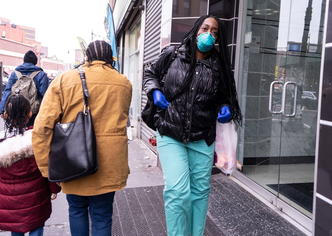 March 18, 2020: Healthcare worker on East 149th Street at Third Avenue, Bronx, New York. © Camilo José Vergara