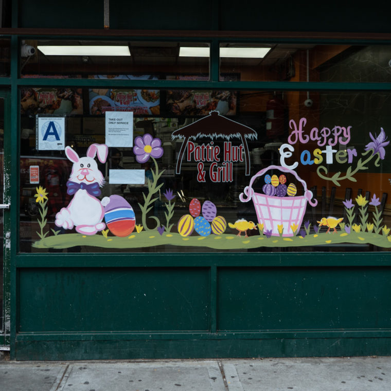 March 25, 2020: Almost as if there were no pandemic, the storefront décor at Pattie Hut & Grill is all about Easter, 516 Nostrand Avenue, Brooklyn, New York. © Camilo José Vergara 