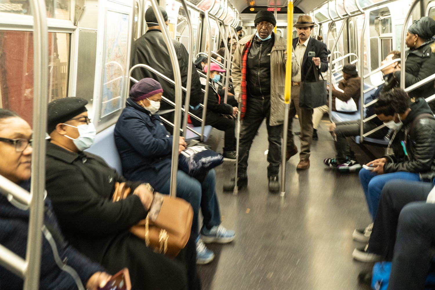 March 30, 2020: Riding the J train at Essex Street subway station, New York, New York. © Camilo José Vergara