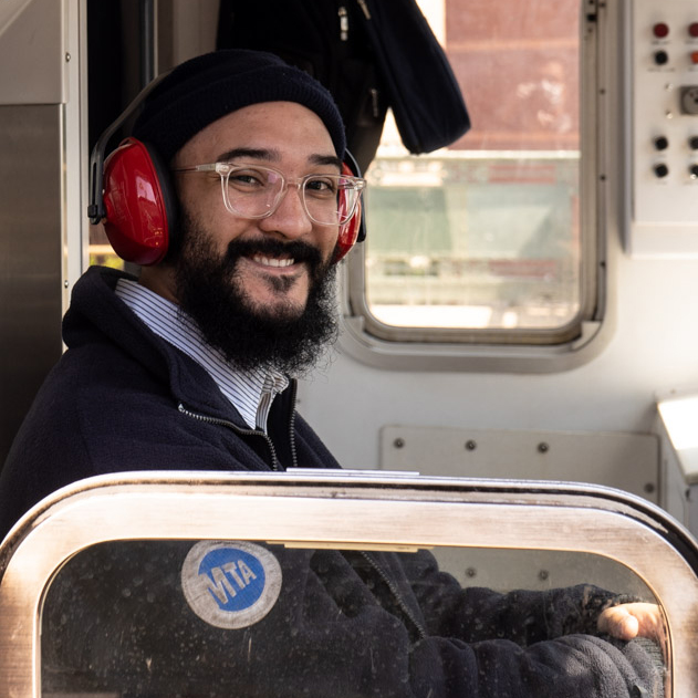 May 10, 2020: Subway conductor at the Simpson Street Subway Station, Bronx, New York. © Camilo José Vergara 