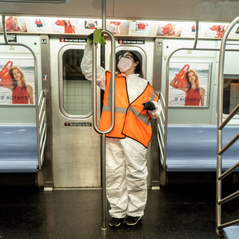 May 12, 2020: Contract worker wearing inferior PPE as she disinfects the interior of an L train on 8th Avenue, New York, New York. © Camilo José Vergara 