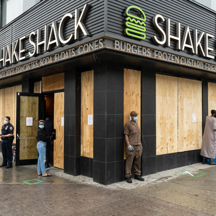 June 3, 2020: An open but boarded up Shake Shack in the aftermath of the violence and looting precipitated by the killing of George Floyd in Minneapolis; Fifth Avenue at 125th Street, Harlem, New York, New York. © Camilo José Vergara 