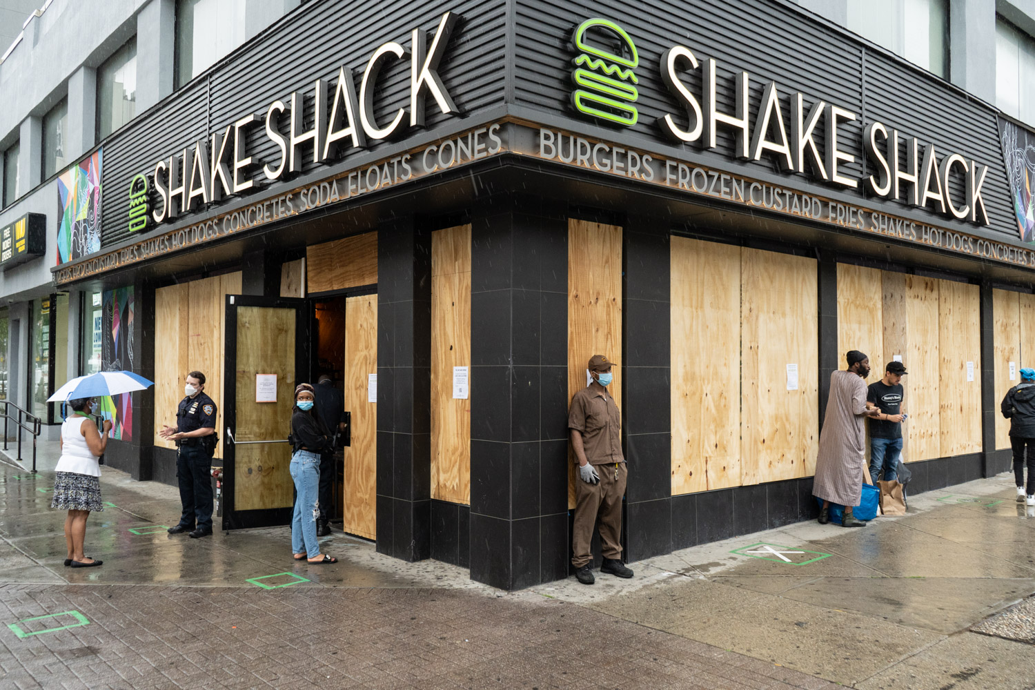 June 3, 2020: An open but boarded up Shake Shack in the aftermath of the violence and looting precipitated by the killing of George Floyd in Minneapolis; Fifth Avenue at 125th Street, Harlem, New York, New York. © Camilo José Vergara
