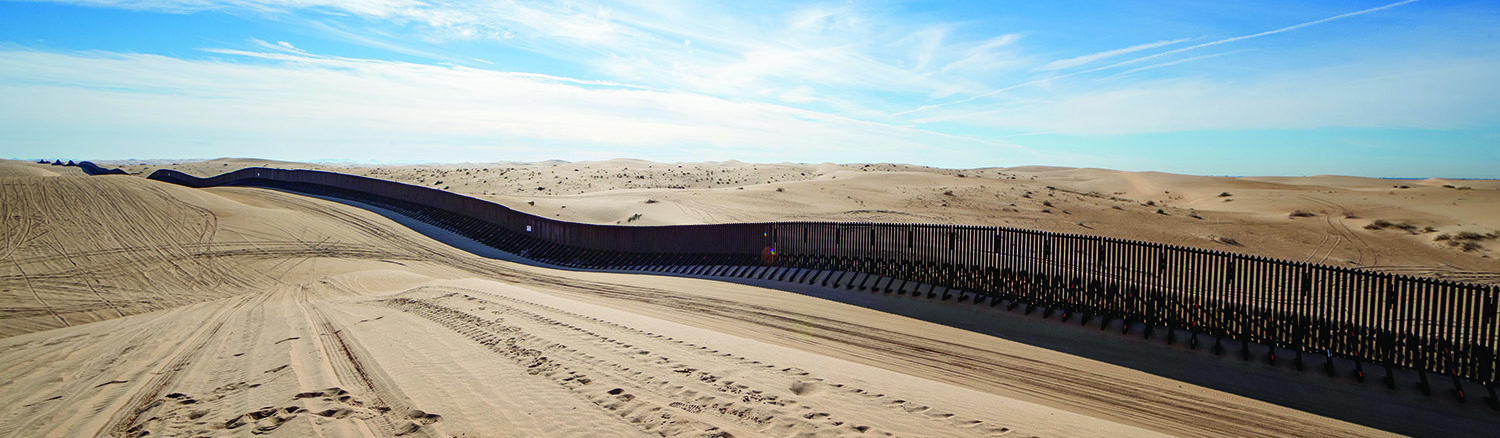 Border Wall In The Imperial Sand Dunes, 20 Miles West Of Yuma, A